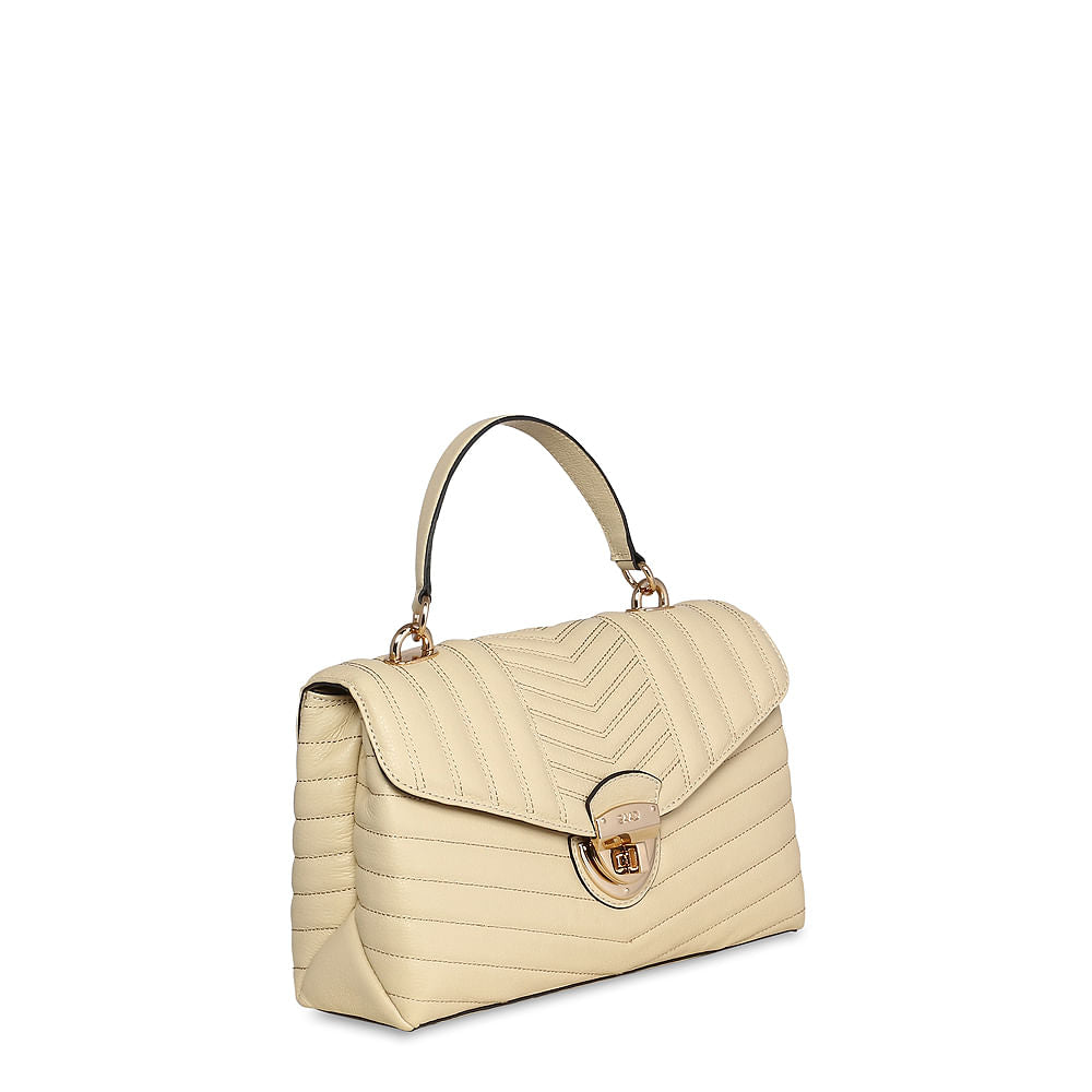 Bolsa bordada em couro